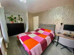 Bedroom One- click for photo gallery